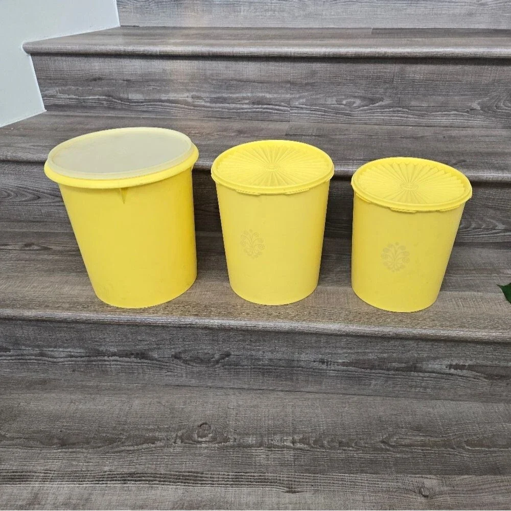 Vintage Tupperware yellow sunburst canister set of 3.